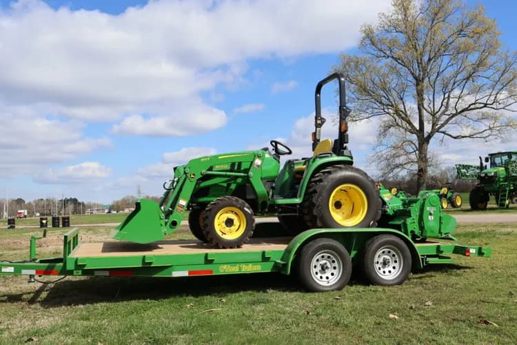John Deere 3032E, 300E Front End loader, RT3062 Rotary Tiller, and a 18' O'neal Trailer