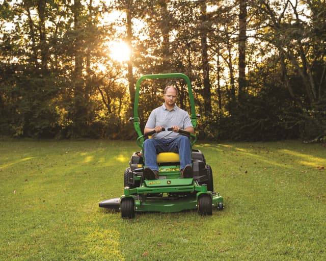 A John Deere Z530M mowing a lawn.