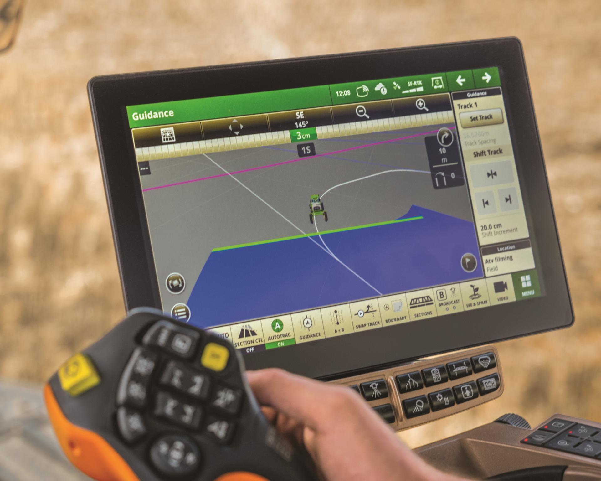 AutoTrac GPS system on a John Deere tractor.