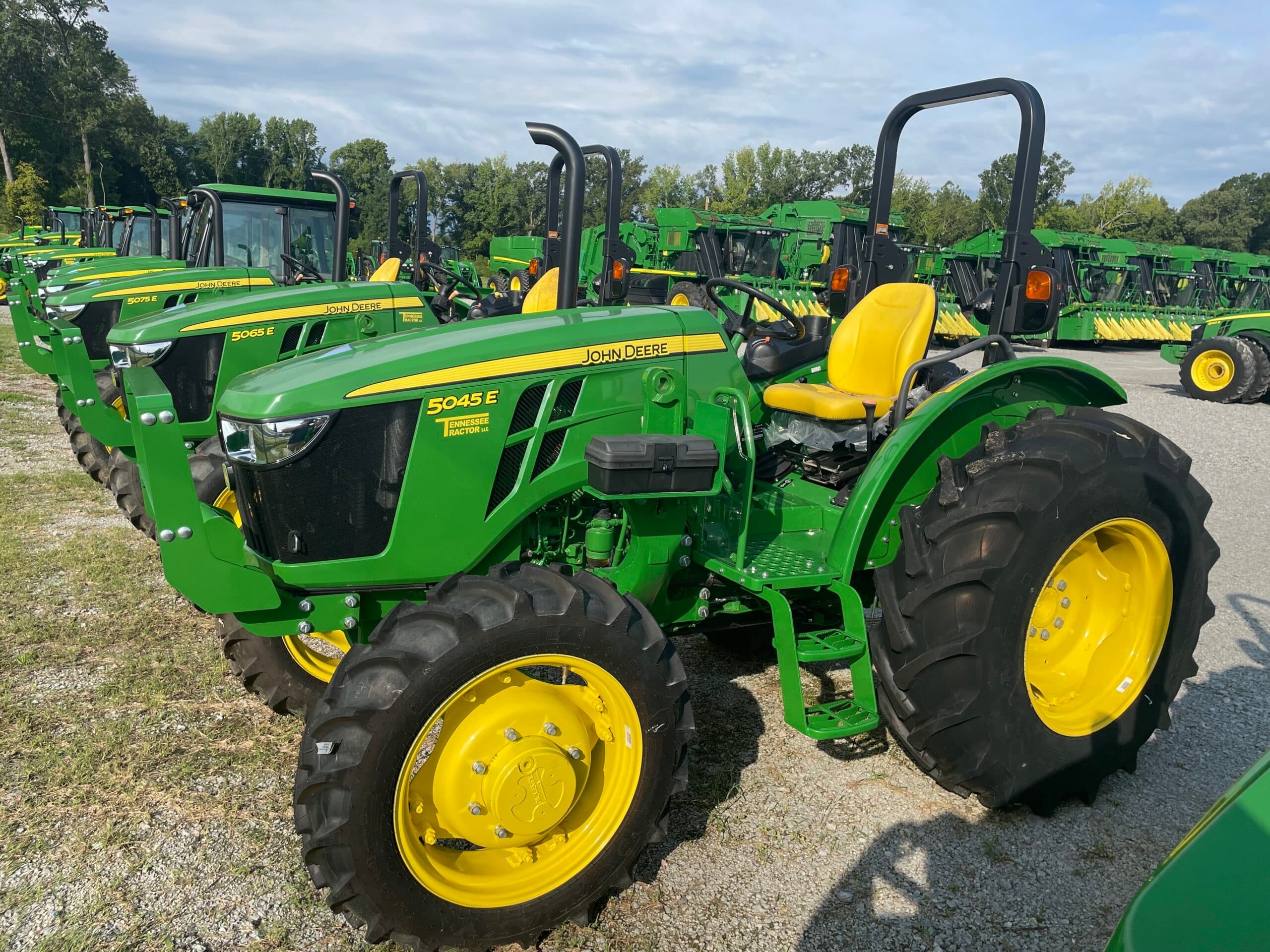 A John Deere tractor in a lot at a Tennessee Tractor dealership.