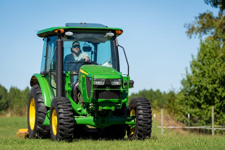 A John Deere tractor operated on a farm in Tennessee.