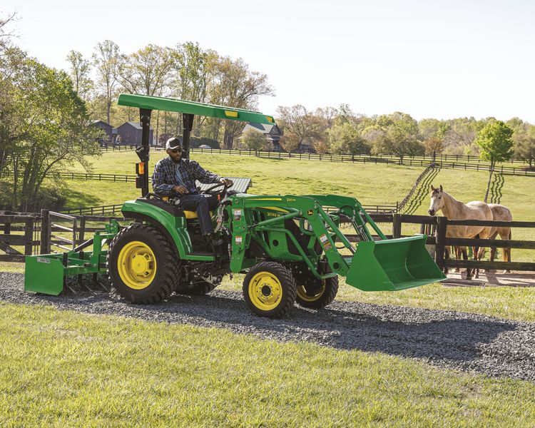 A tractor package with a compact tractor and attachments.