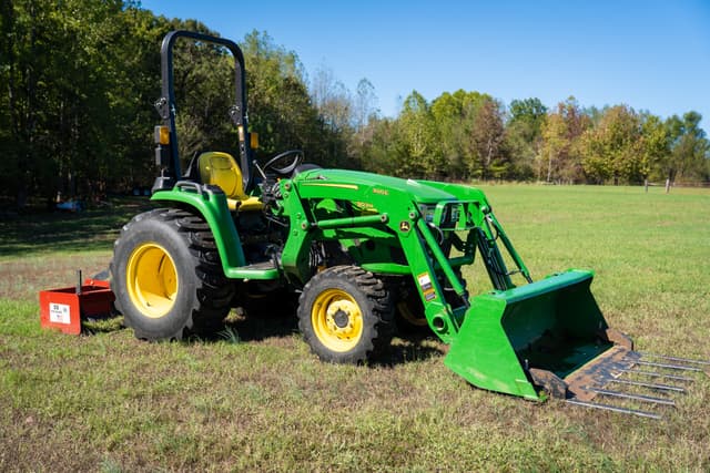 DSC01579 A John Deere tractor with a box blade attachment in a field in West Tennessee.