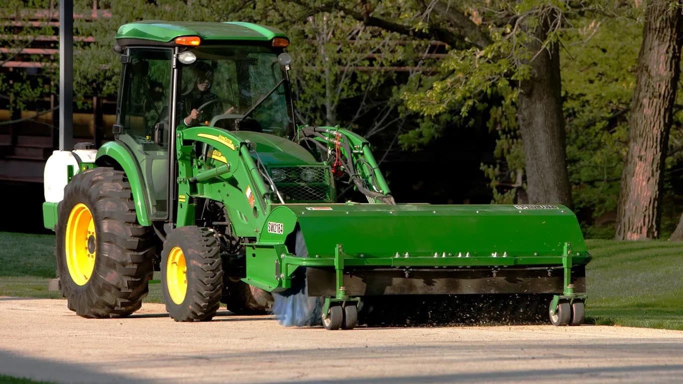 John Deere rotary broom attachment.
