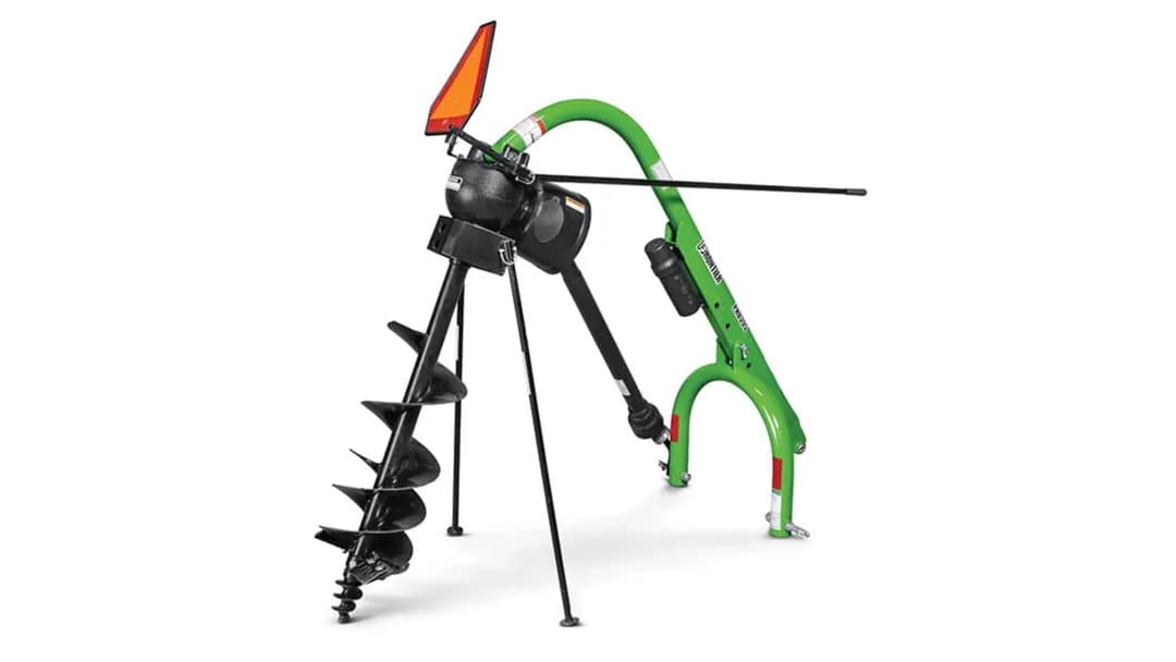 A post-hole digger attachment for a tractor.