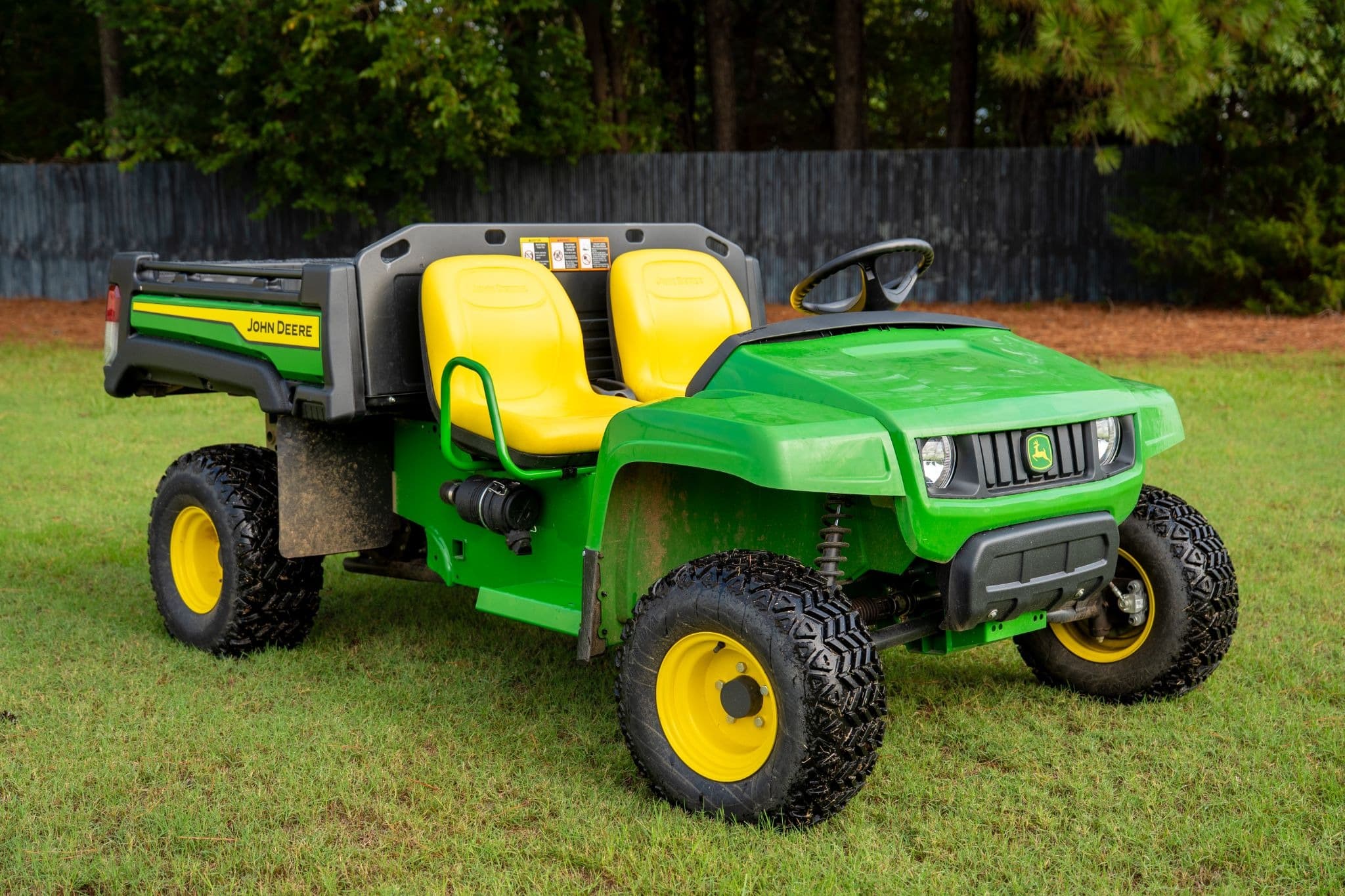 An electric-powered John Deere Gator XUV.